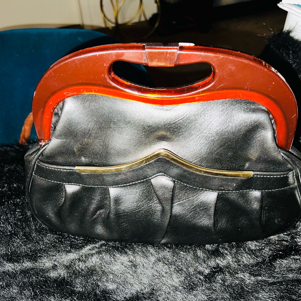 Perfect little black purse! Vintage clutch with handle.